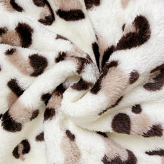 AWSOLAR leopard print swaddle offers stylish coziness for infants' rest.