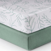 Babebay sage green fitted crib sheet in soft jersey cotton for gentle sleep.