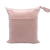 Babeine Wet Dry Bag in Lotus color, folded compact for travel.