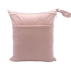 Babeine Wet Dry Bag in Lotus color, folded compact for travel.