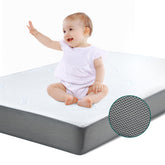 BABELIO premium memory foam crib mattress cover shows a breathable surface for baby comfort.