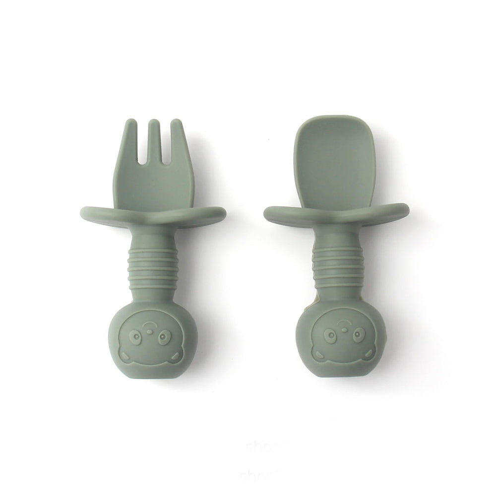 Babies and Cuties toddler fork and spoon set with anti-choke shield for safe self-feeding.