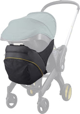 Baby & Beyond clip-on storage bag attached to a Doona stroller for on-the-go storage.