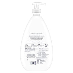 Baby Dove lotion applied to a newborn arm for gentle, lasting moisture after bath.