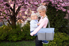 Baby Essentials Diaper Bag Tote showing external wipes pocket for quick access