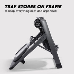 Tray clips to the back of the City Bistro high chair when folded in graphite.