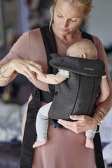 BabyBjörn Baby Carrier Mini hip-healthy support highlighted for growing hips.