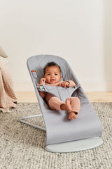 BabyBjörn Bouncer Bliss petal quilt pattern highlights gentle design and cozy aesthetics.