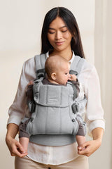 BabyBjörn Harmony 3D mesh ventilation demonstrates breathable comfort.