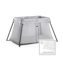 BabyBjorn Travel Crib Light in silver with quick setup for on-the-go families.