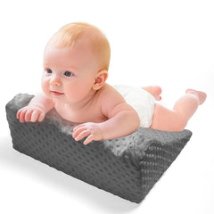 Babycare memory-foam nursery support cushions baby's tummy time.