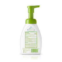 Hands using BabyGanics fragrance-free sanitizer for sensitive skin and quick cleanliness.