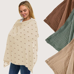 Babylicious muslin nursing cover with arch neckline offers visibility and airflow.