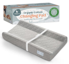 Babylicious organic cotton changing pad provides breathable comfort during diaper changes.
