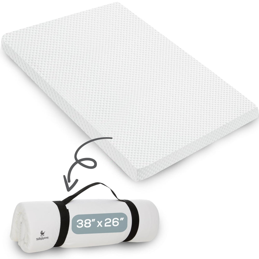 Babylicious roll-up pack and play mattress pad for travel convenience and comfort.