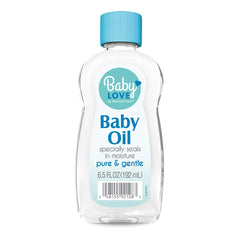 Babylove Sleepy Nights baby oil bottle — locks in moisture on damp skin.