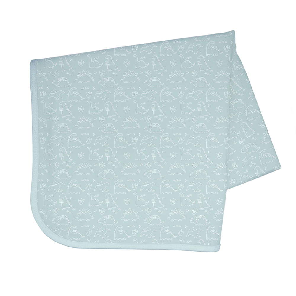 BapronBaby Dino Friends Sage Splash Mat under a high chair catching spills and splashes.