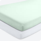 Bare Home 2-pack fitted crib sheets in spring mint and white, ready for bedtime comfort.