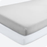Bare Home 2-pack fitted crib sheets in Cloud Grey and White provide snug mattress fit.