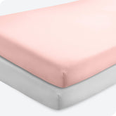 Bare Home 2-pack crib sheets packaging highlights soft microfiber and easy-fit design.