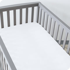Bare Home crib sheet elastic edge close-up highlighting durable binding