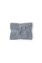 Barefoot Dreams CozyChic Lite Moonbean blanket draped for tummy time and comfort