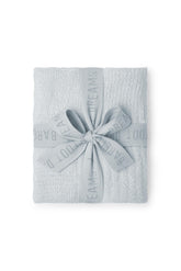 Barefoot Dreams CozyChic Lite blanket in blue showing velvety softness for naptime