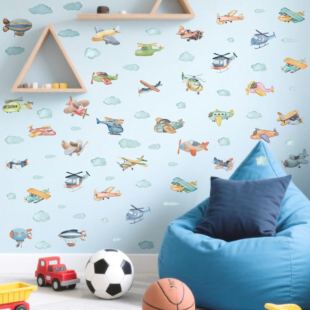 Barri Design colorful airplane wall decals brighten kids' rooms with playful aircraft scenes.
