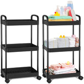 Barydat three-tier diaper caddy rolling cart beside changing table for quick access.