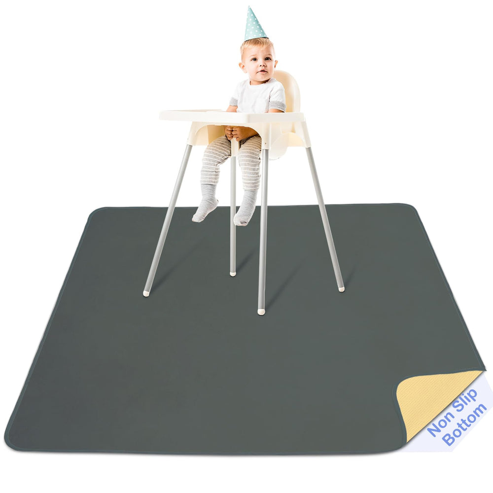 Basumee Splat Mat under high chair catches spills and protects floors.