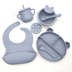 Bear-shape suction bowl in dark blue keeps meals tidy for family dinners.