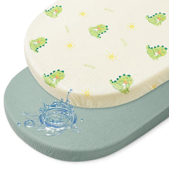 BeBeJoJo bassinet sheets with muslin top in green dinosaur pattern for gentle newborn comfort.
