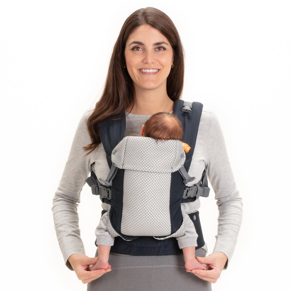 Beco Gemini newborn-seat adjustment shows growing infant comfort
