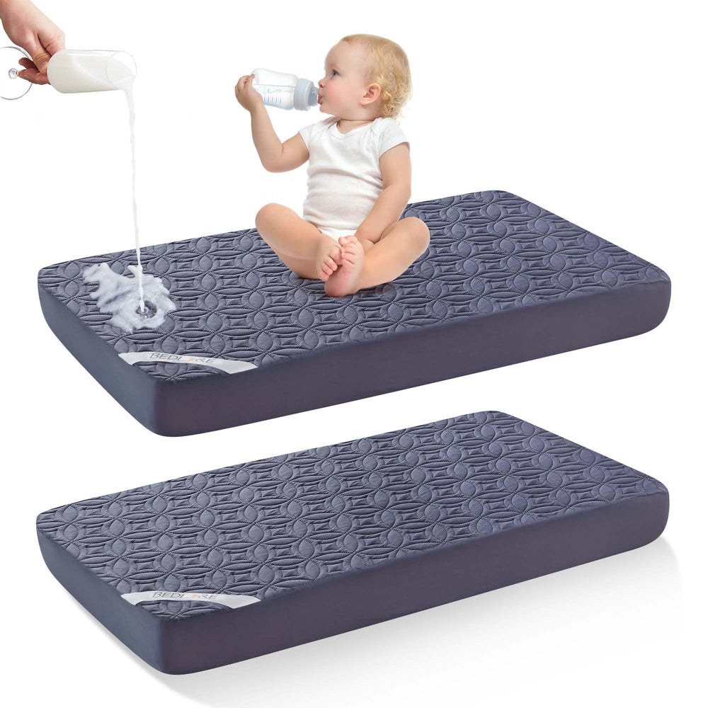 BEDLORE waterproof crib mattress protector, top view, protects against spills.