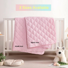 BEDSUM pink quilt shown in a nursery highlights breathable, cozy feel.