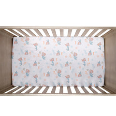 Bedtime Originals Ariel seashells bubbles print brightens the nursery ambiance.