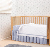 Bedward Stars quilt close-up showing soft cotton weave for cozy nursery moments.
