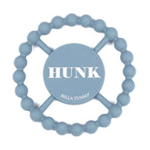 Bella Tunno Hunk teether blue round: safe, soothing gum relief for tiny fingers.