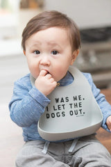 Bella Tunno Let The Dogs Out bib showing big pocket and silicone surface for quick wipe-down
