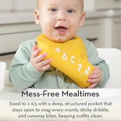 Bella Tunno Little Bites Bib pocket catches mess during meals.