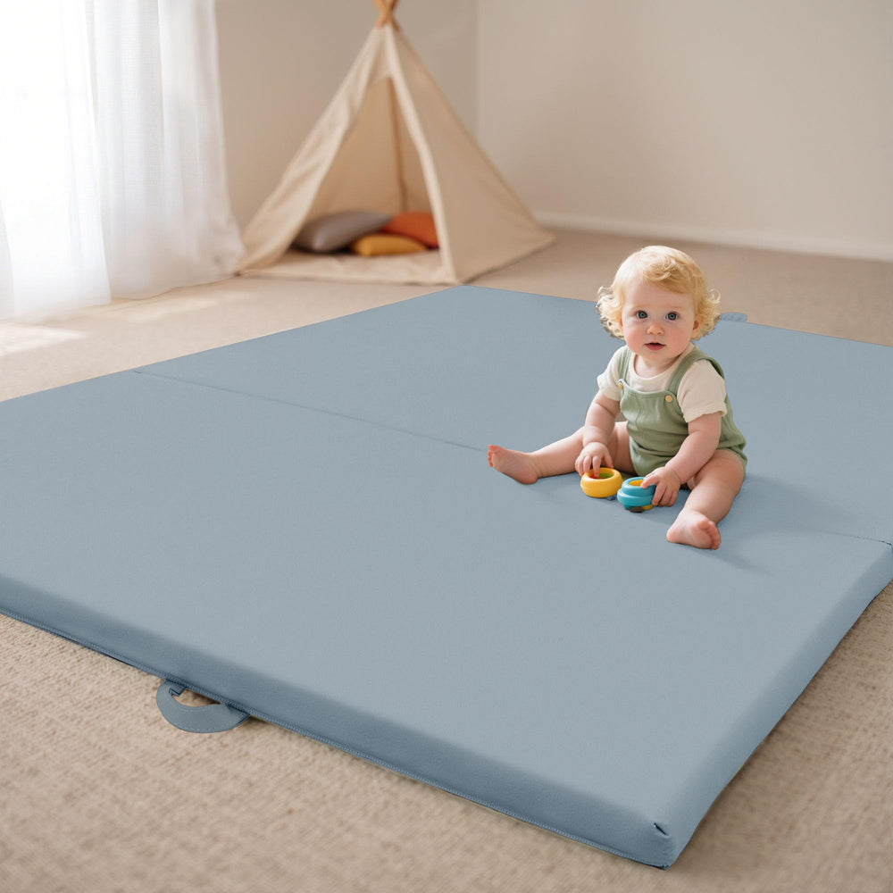 Bella's Friends foldable play mat open for a spacious 50x50 inch play area.