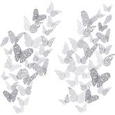 Bememo 72-piece 3D butterfly wall decals in silver add a shimmering wall accent.