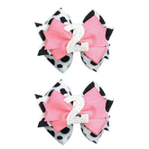 Besaleck birthday hair clips with cow print and white number for a festive 2nd birthday.