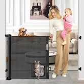 BETERTEK retractable gate with cat door in doorway for pet separation.