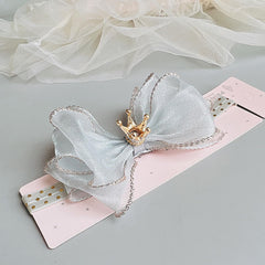 Bethynas gray baby hair accessory with bowknot and crown detail