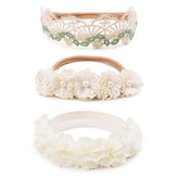 BFNAAgirl floral headband close-up shows rhinestones for gentle sparkle on special occasions.