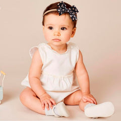 BFNAAgirl flower-collection headband on a lightweight nylon elastic band