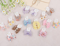 BIANHUAN hair ties closeup: durable elastic bands with decorative bows.