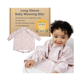Bibado long-sleeve coverall bib on a highchair keeps clothes clean.