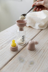 BIBS feeding scene with ivory bottle ideal for daily use.